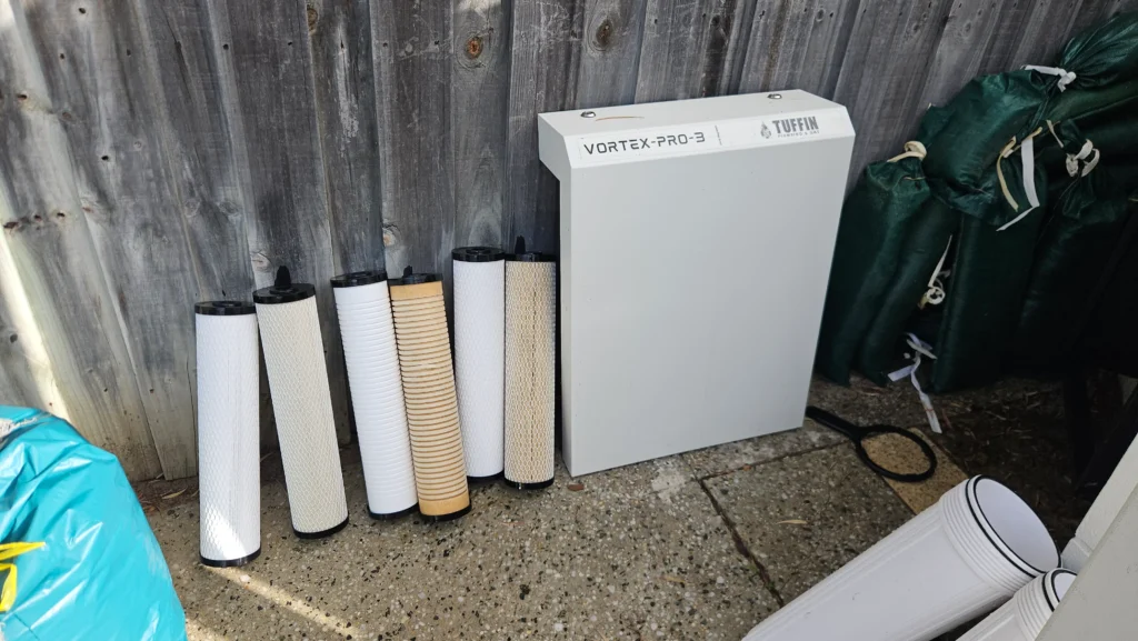 Vortex Pro 3 cover and filter cartridges laid out during a Dunsborough filter change